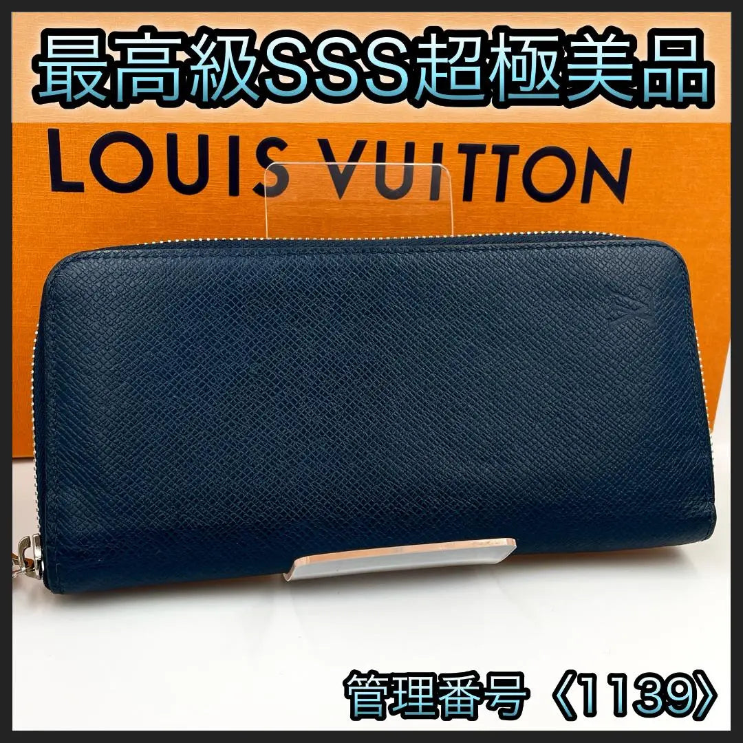 Cartera larga Louis Vuitton Taiga Zippy Wallet Vertical 1139