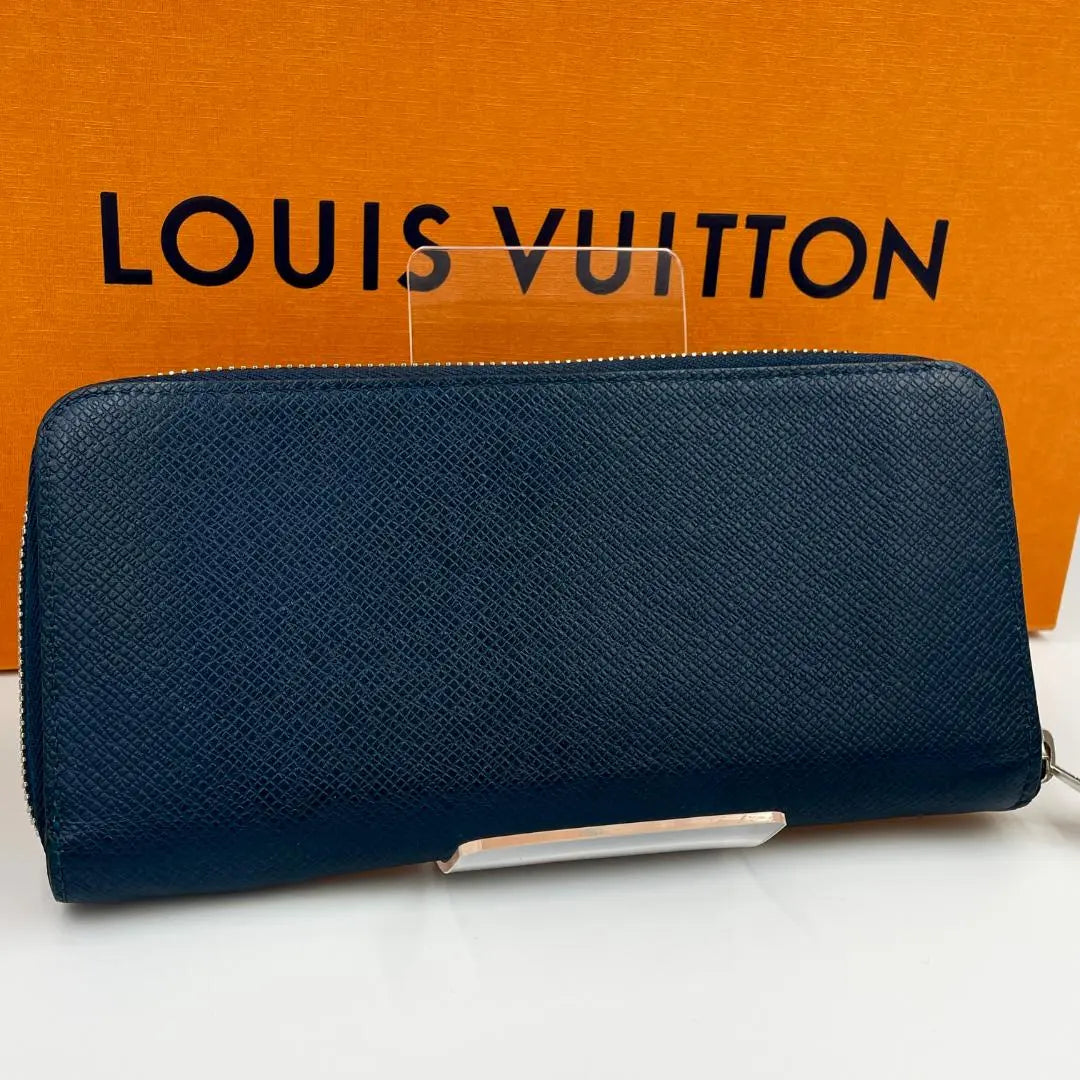 Cartera larga Louis Vuitton Taiga Zippy Wallet Vertical 1139