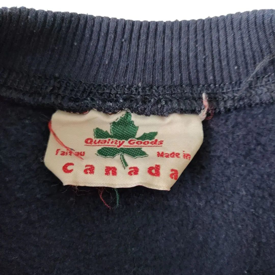 [Flag logo, made in Canada] QUALITY GOODS sweatshirt