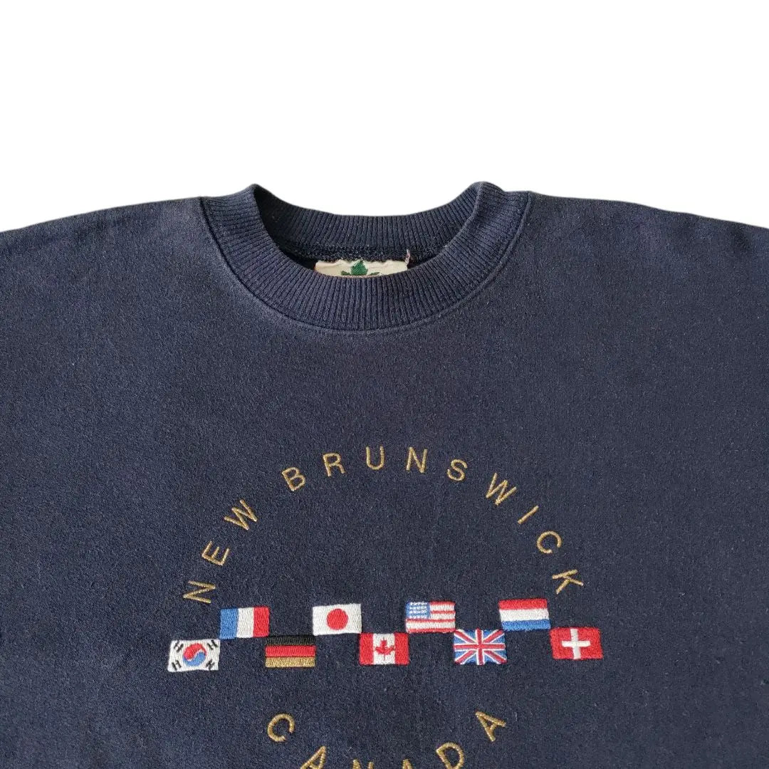 [Flag logo, made in Canada] QUALITY GOODS sweatshirt