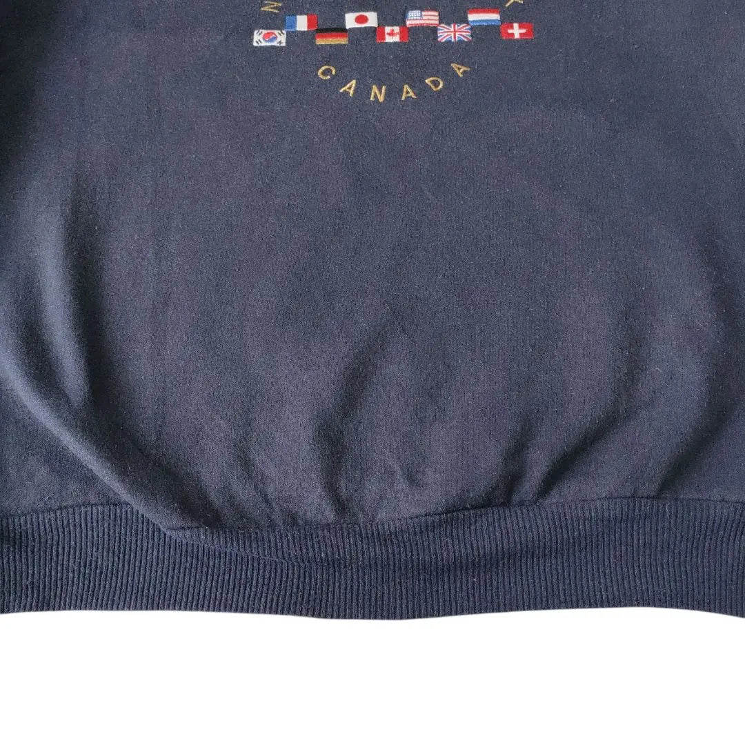 [Flag logo, made in Canada] QUALITY GOODS sweatshirt