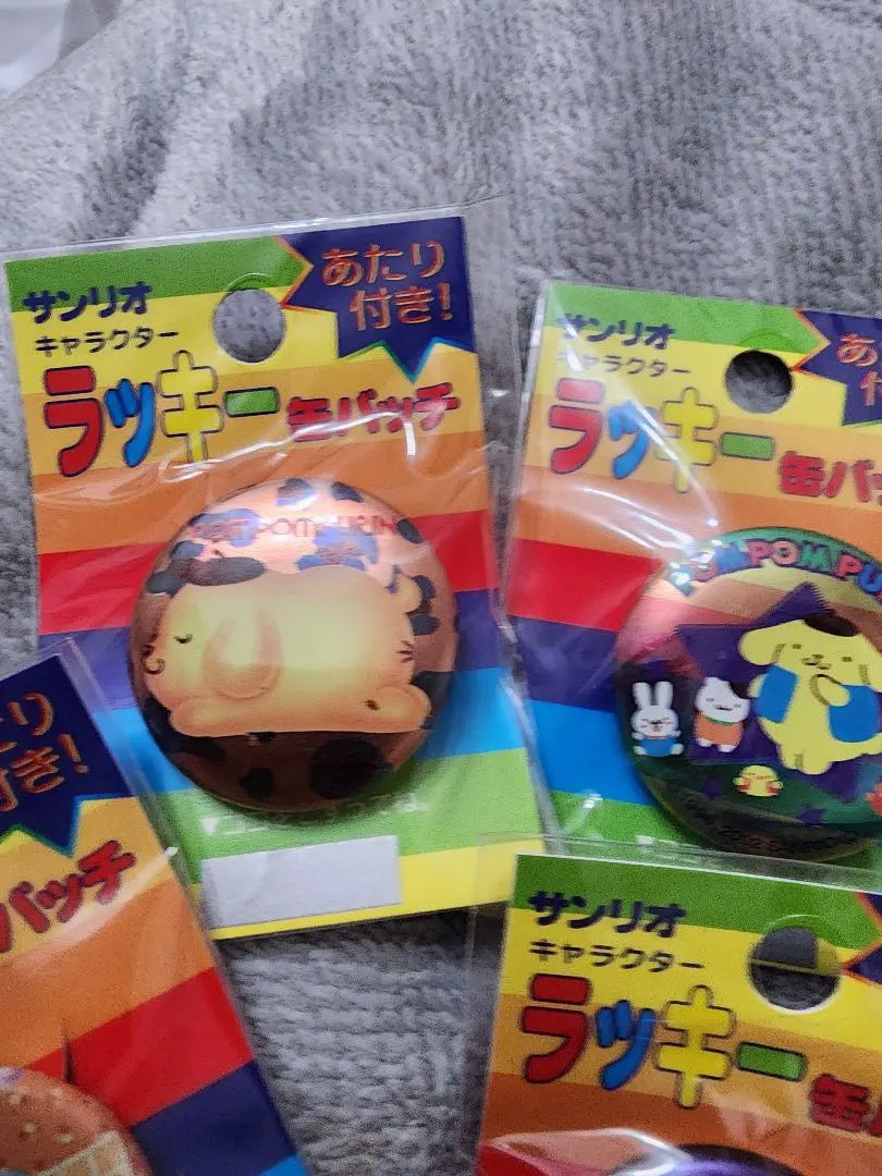 Pom Pom Pudding can badge unopened at the time