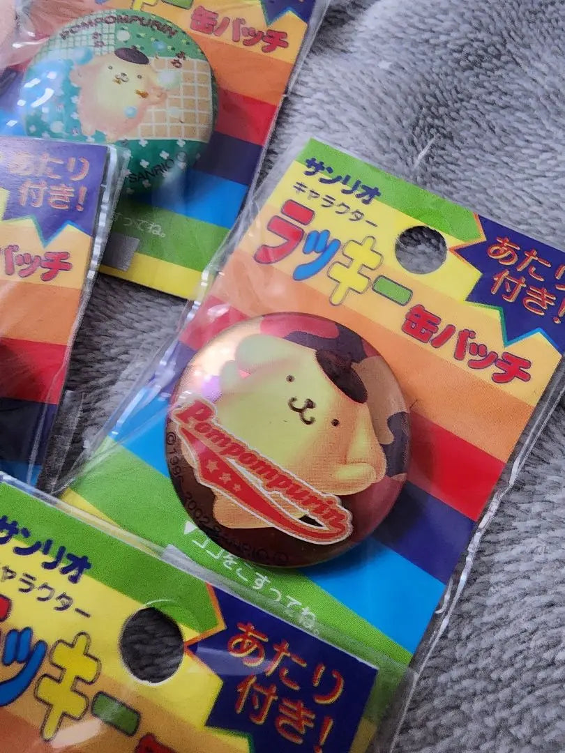 Pom Pom Pudding can badge unopened at the time