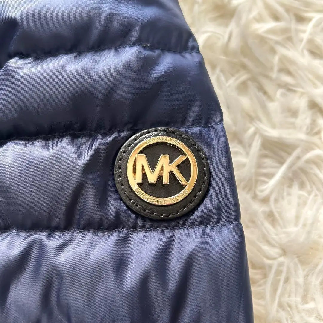 Artículo muy bonito ✨ Chaqueta de plumas Michael Kors con cinturón de cinta y capucha para guardar cosas XXS