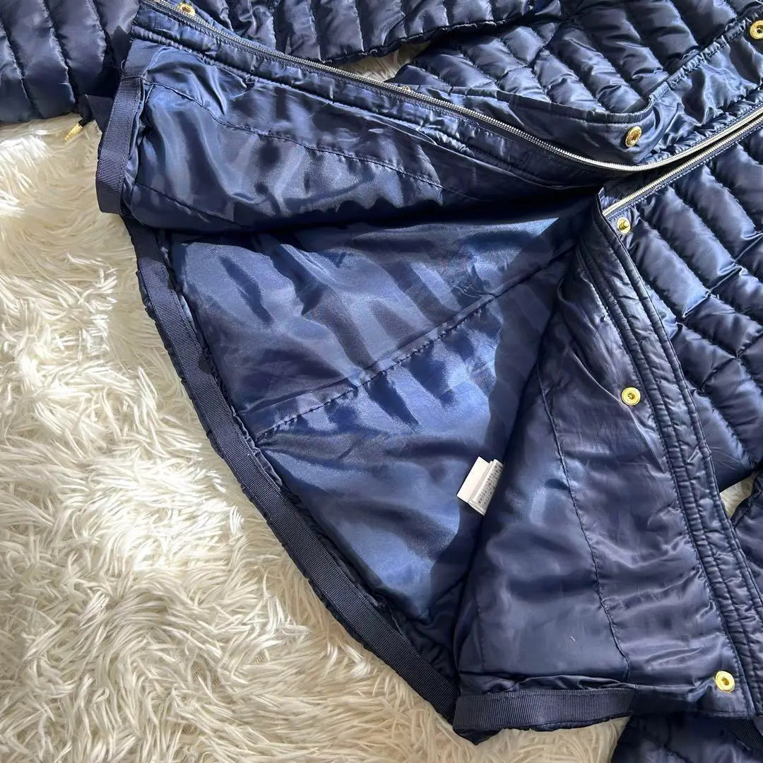 Artículo muy bonito ✨ Chaqueta de plumas Michael Kors con cinturón de cinta y capucha para guardar cosas XXS