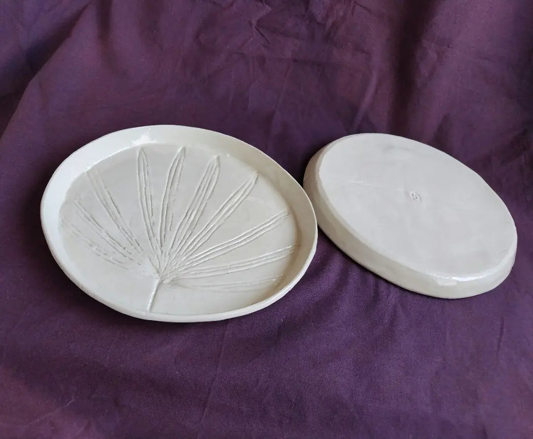 White-faced leaf pattern set of two, unused, just like new