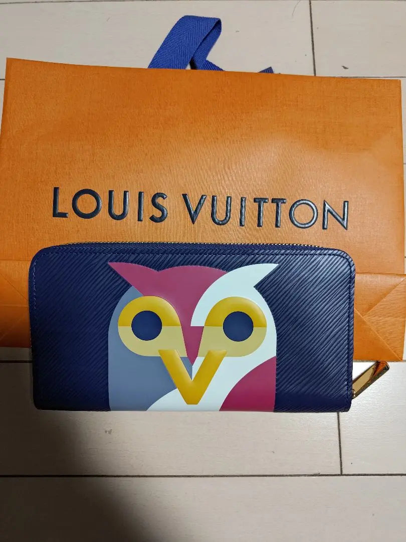 Rare, unused, Vuitton Owl Epi Zippy Wallet