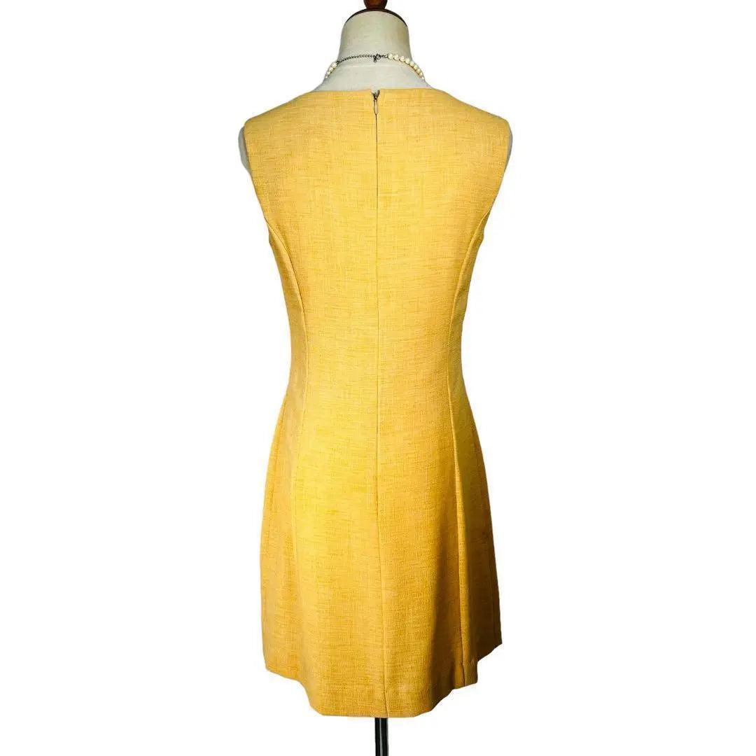 Conjunto de una pieza y chaqueta BOWLER, manga corta, amarillo, con cinturón