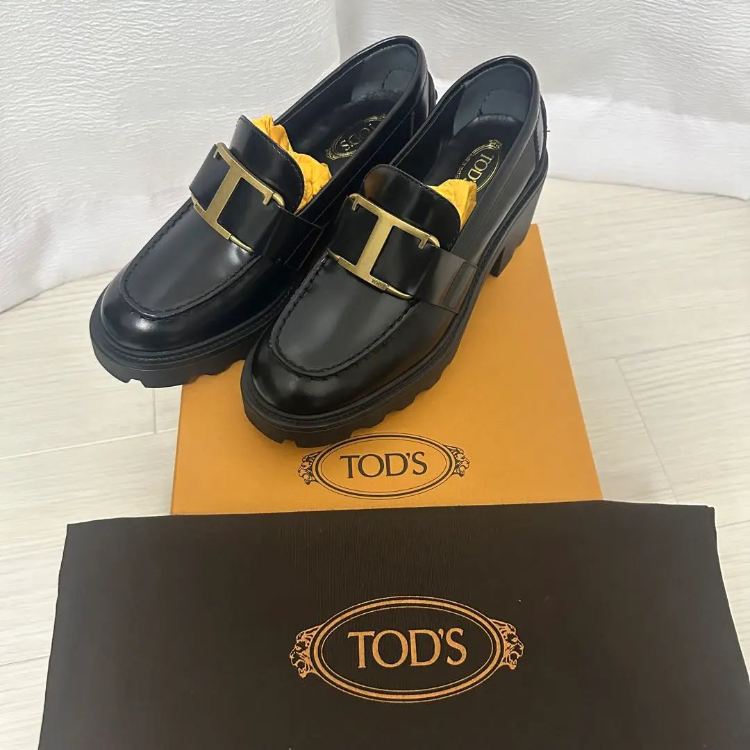 New and unused TOD'S black leather loafers