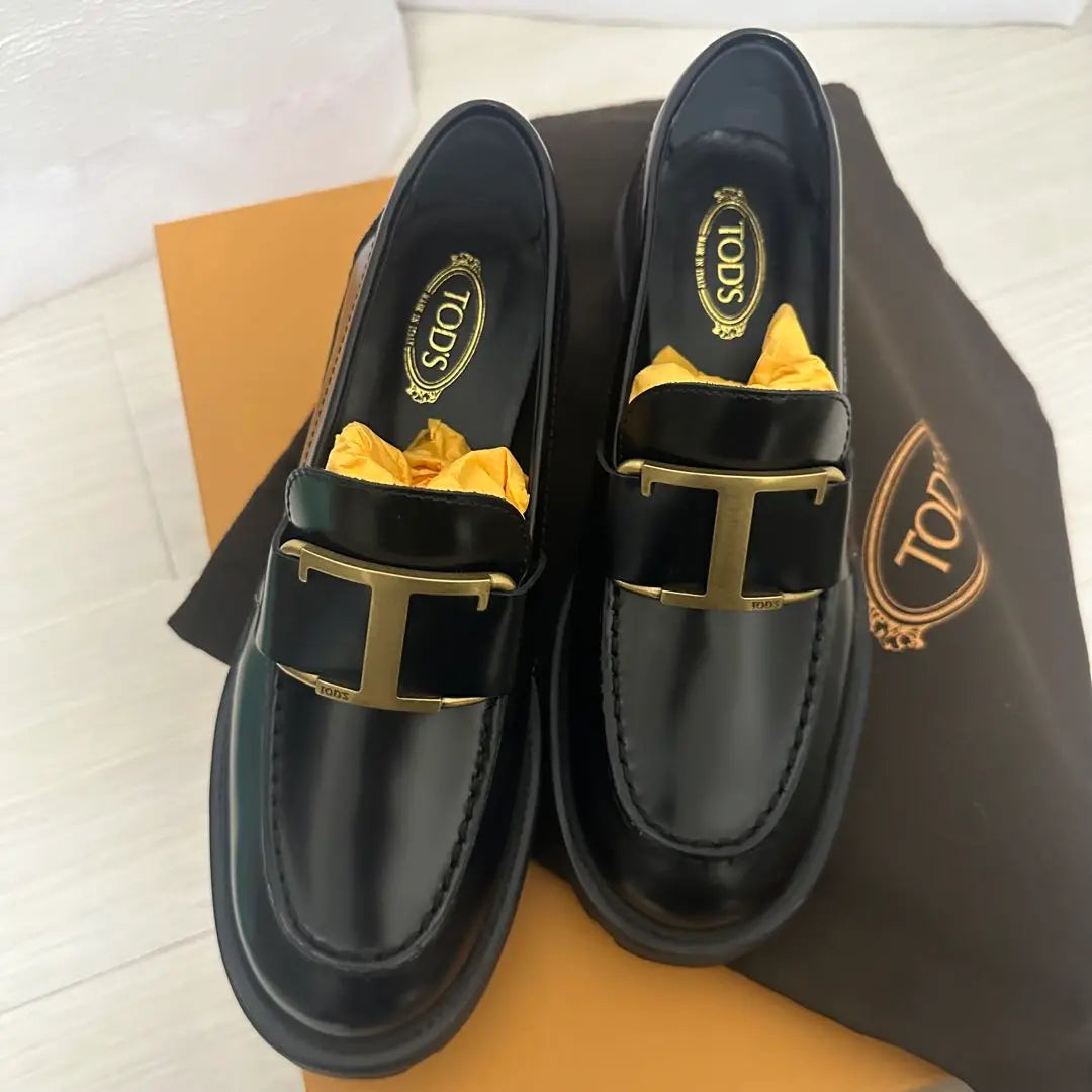 New and unused TOD'S black leather loafers