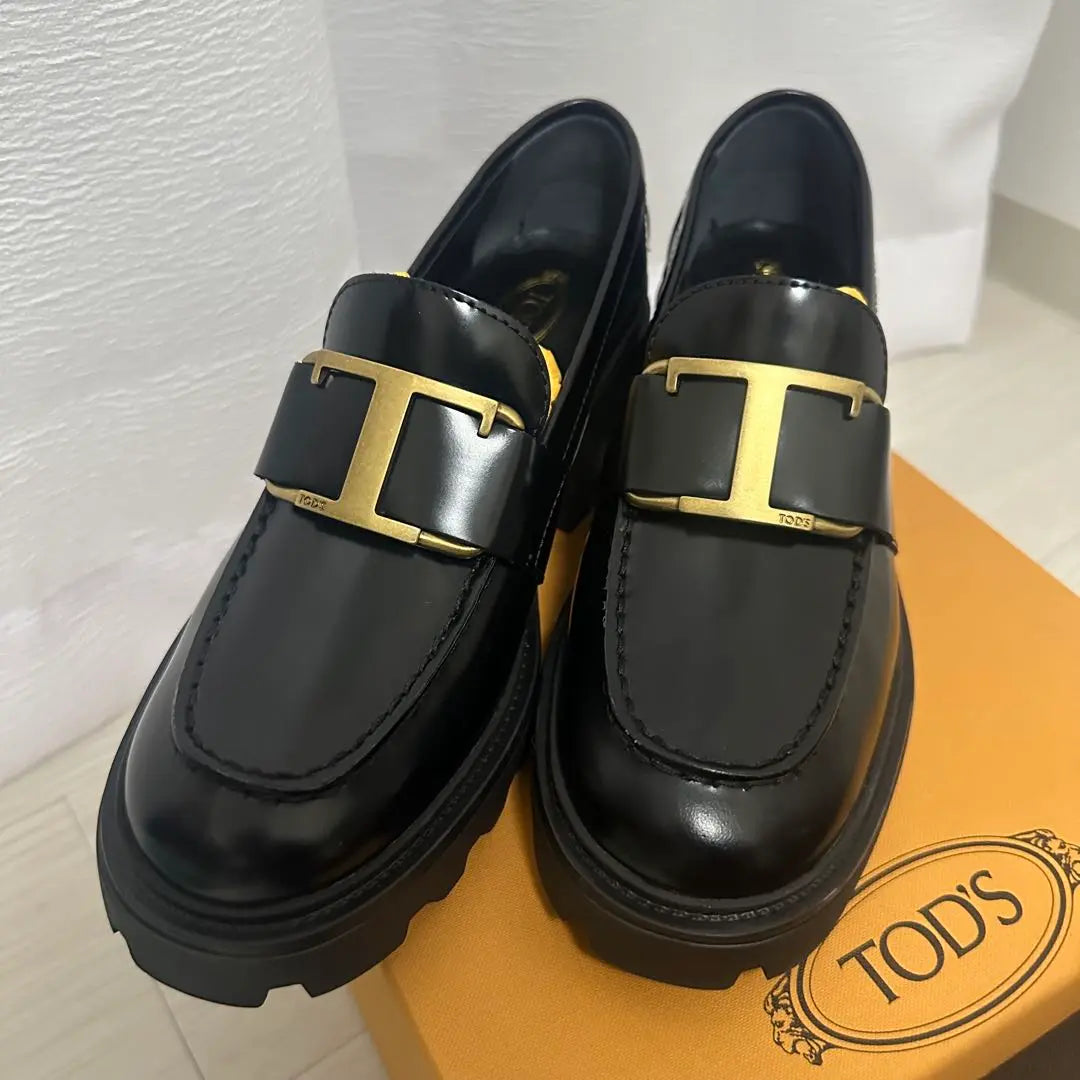 New and unused TOD'S black leather loafers