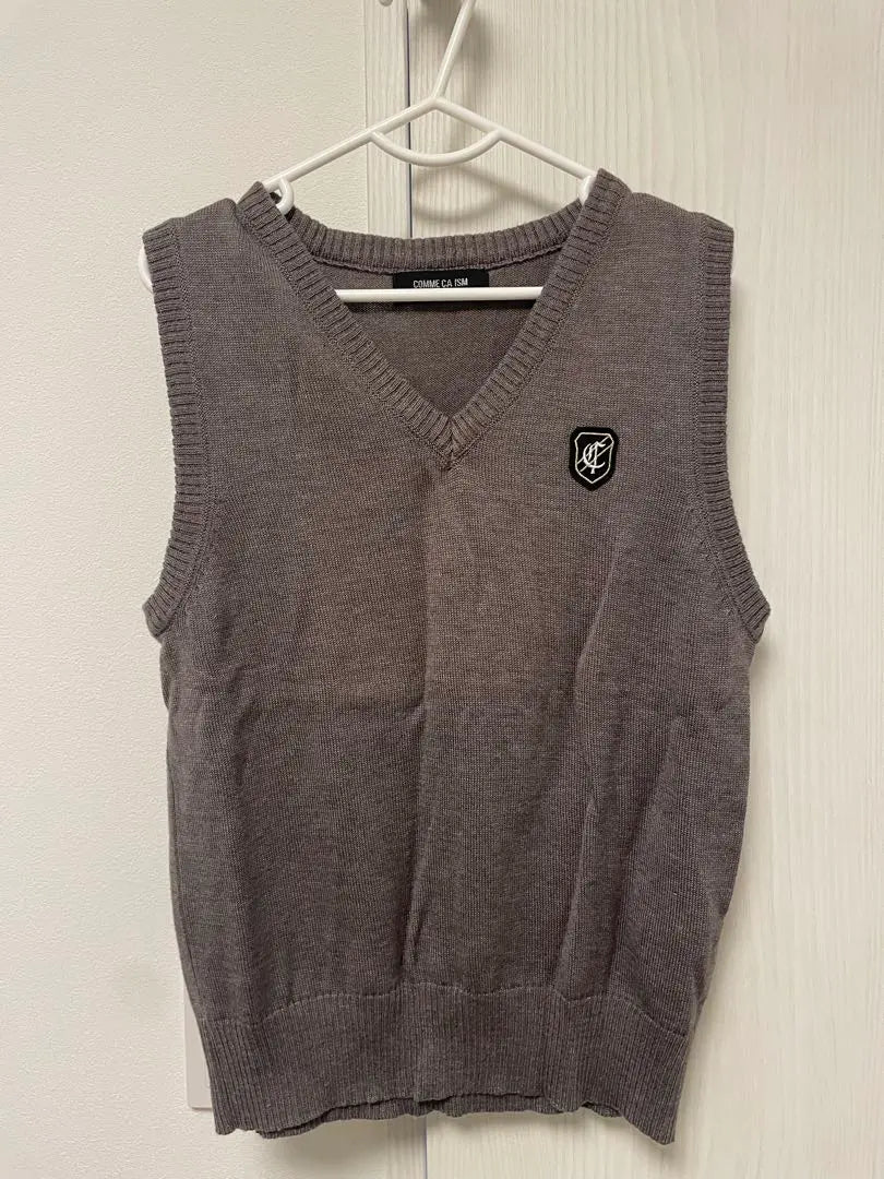 Grey V-neck sleeveless sweater