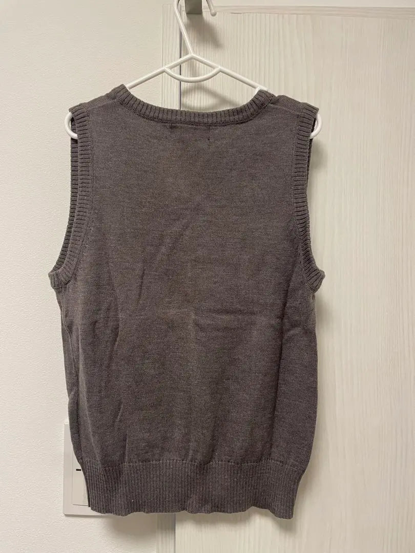 Grey V-neck sleeveless sweater