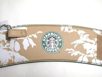 Taza de café con funda de Starbucks